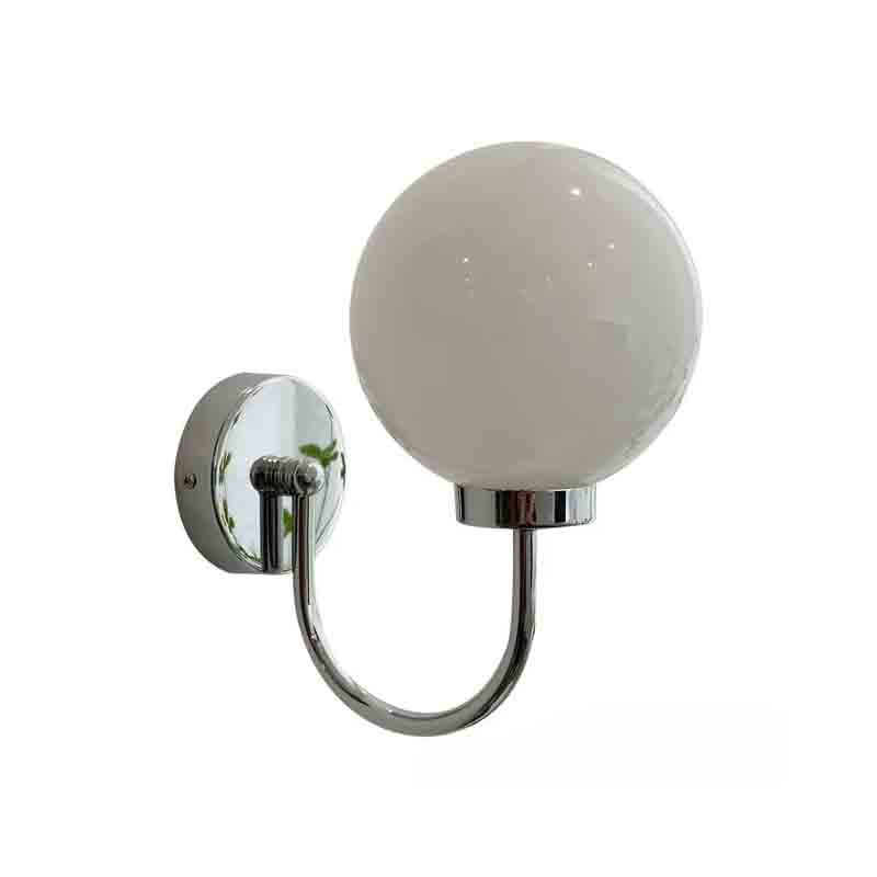 Celestial Orb Wall Lamp showcasing its elegant swoop-style arm and glossed glass lampshade in a modern setting.