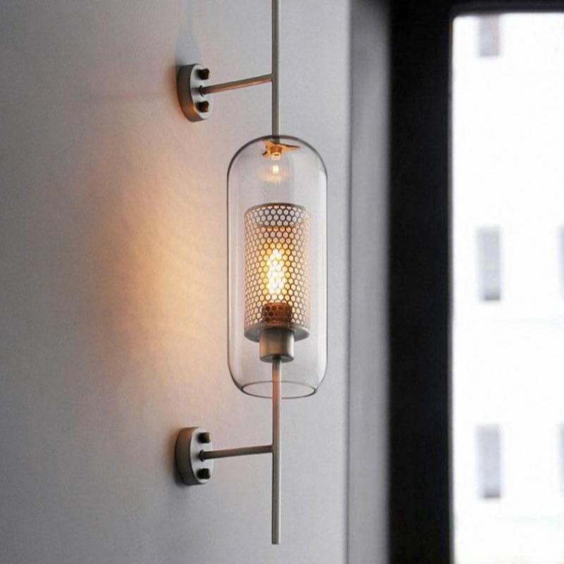 Honeycomb Radiance Orb Sconce elegantly illuminating a cozy living room corner with its soft, golden glow.