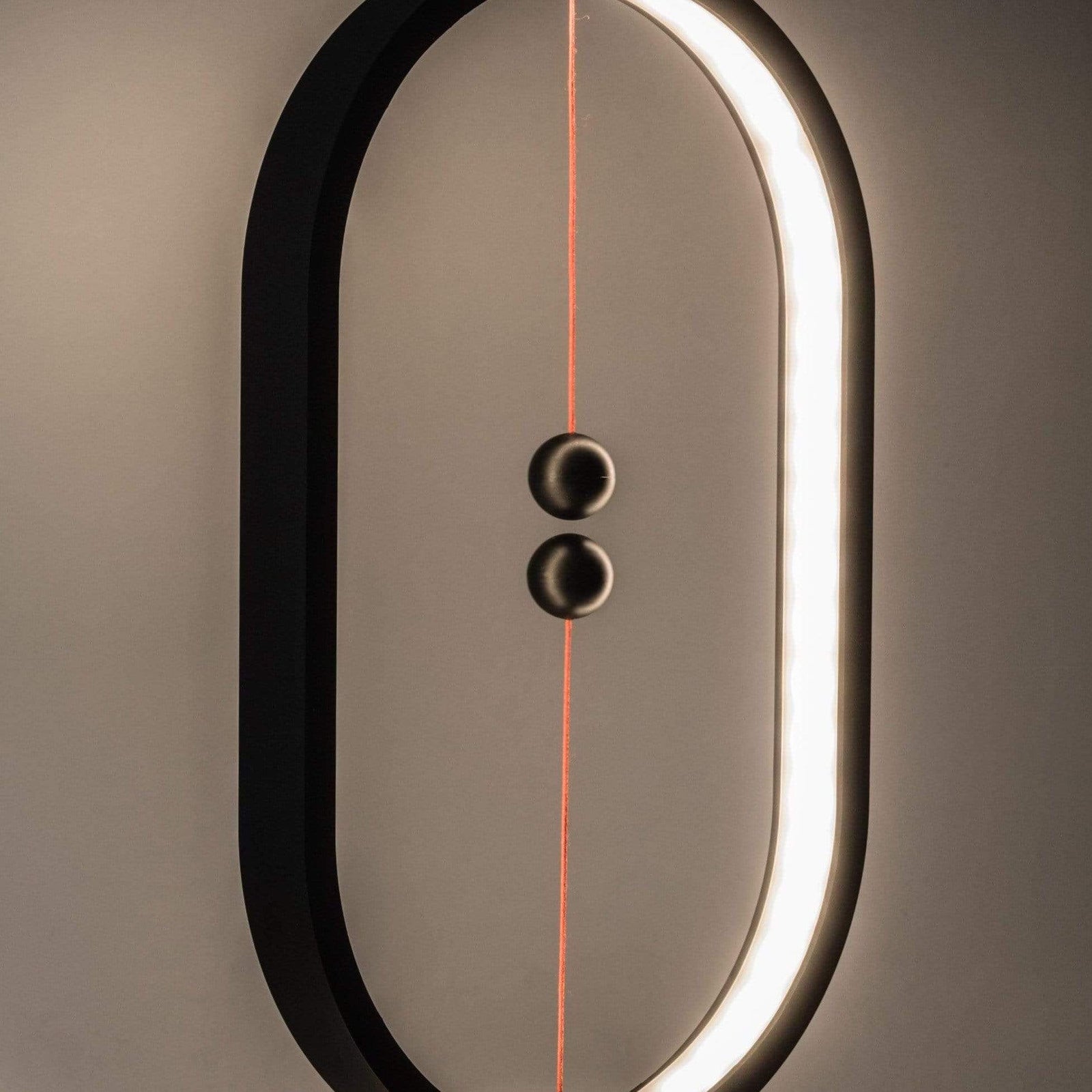 Heng Balance Desk Lamp showcasing its unique balance mechanism and sleek design on LuxusHeim.