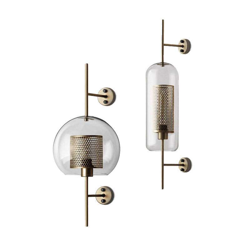 Honeycomb Radiance Orb Sconce elegantly illuminating a cozy living room corner with its soft, golden glow.