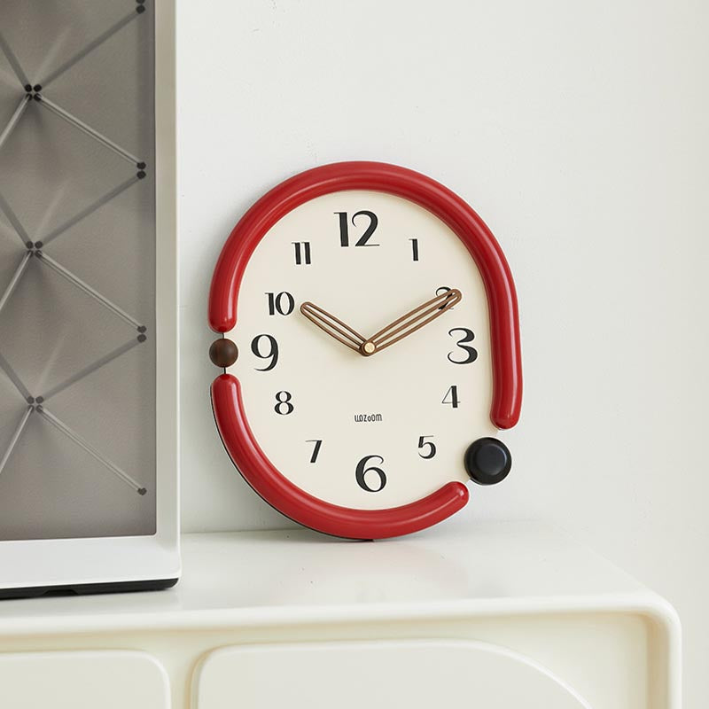 Artistic 'Time in a Twist' wall clock with a twisted frame design for a modern interior.