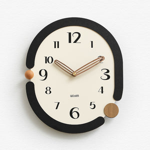 Artistic 'Time in a Twist' wall clock with a twisted frame design for a modern interior.