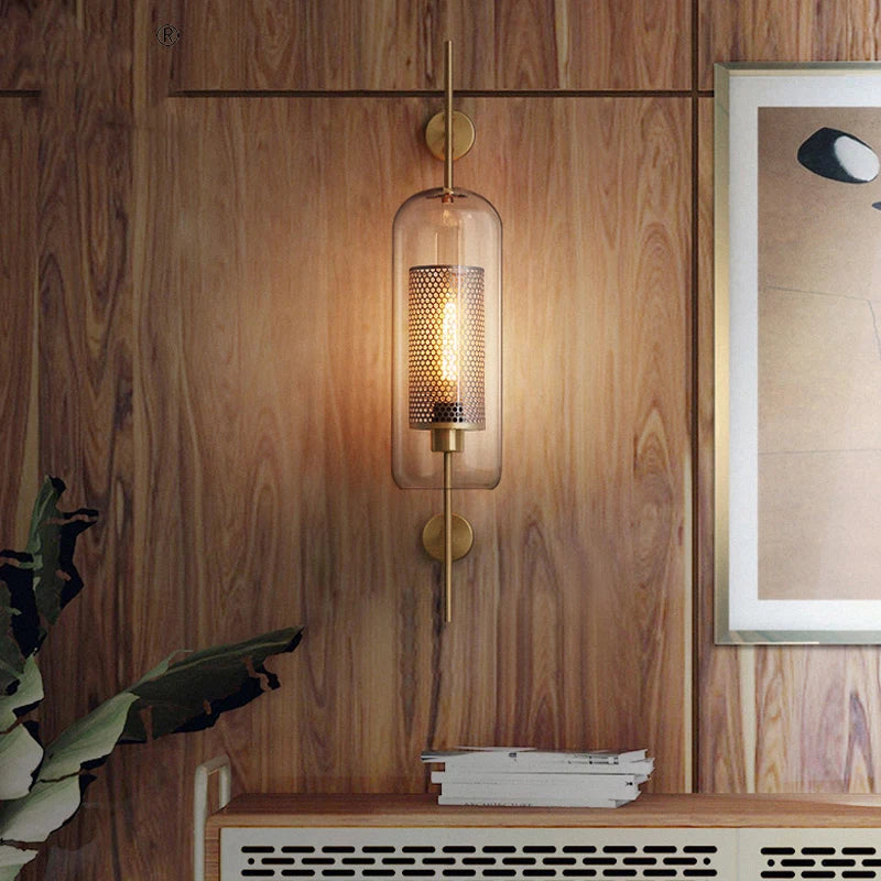 Honeycomb Radiance Orb Sconce elegantly illuminating a cozy living room corner with its soft, golden glow.