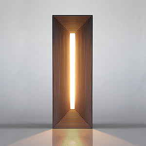 Infinite Illusion LED Lamp on a wooden table, glowing with its mesmerizing celestial illusion.