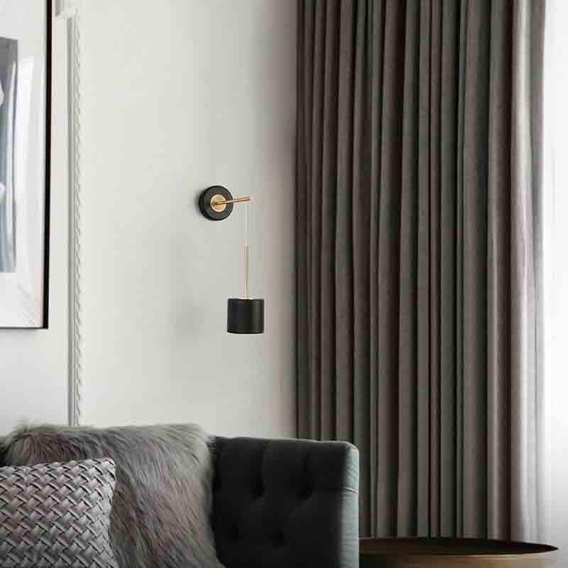 Lustra Calibre Suspended Wall Lamp with its polished iron finish and built-in LED lighting in a contemporary setting.