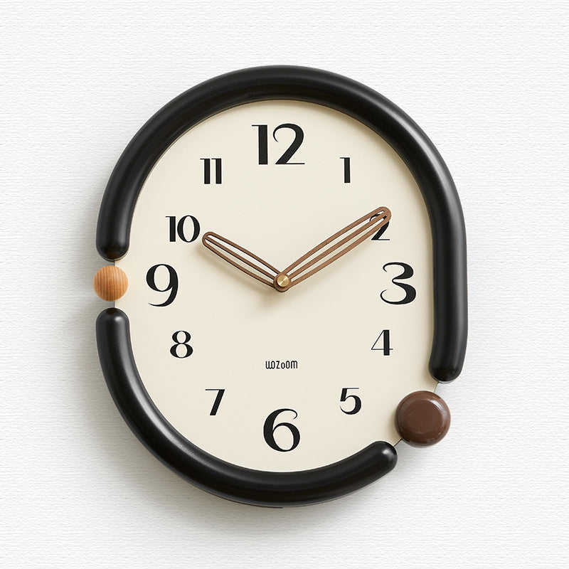 Artistic &#39;Time in a Twist&#39; wall clock with a twisted frame design for a modern interior.