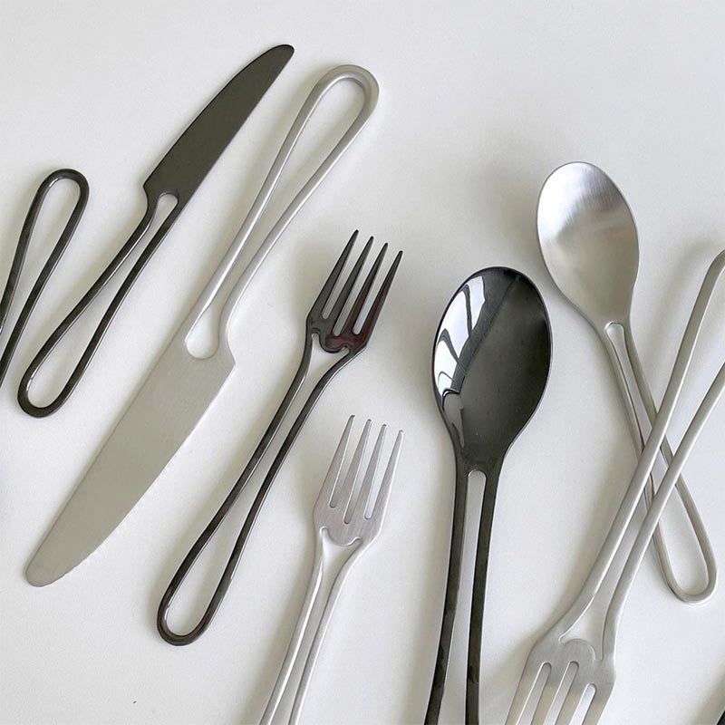 Elegant Svelte Void Cutlery Collection featuring minimalist design with hollow handles