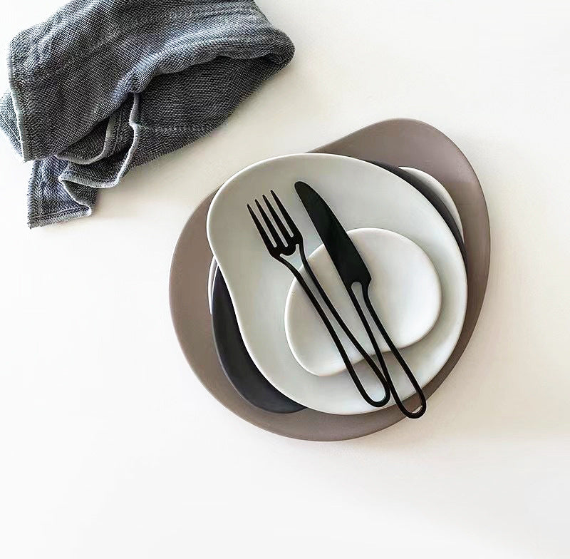 Elegant Svelte Void Cutlery Collection featuring minimalist design with hollow handles