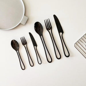 Elegant Svelte Void Cutlery Collection featuring minimalist design with hollow handles