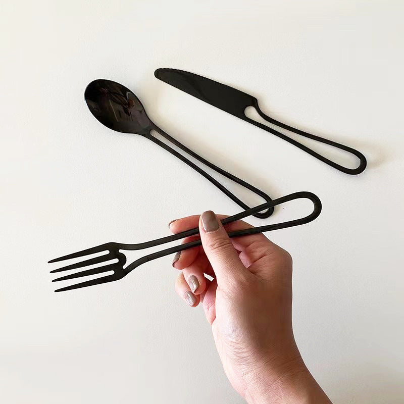 Elegant Svelte Void Cutlery Collection featuring minimalist design with hollow handles