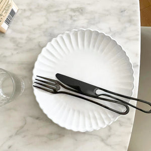 Elegant Svelte Void Cutlery Collection featuring minimalist design with hollow handles