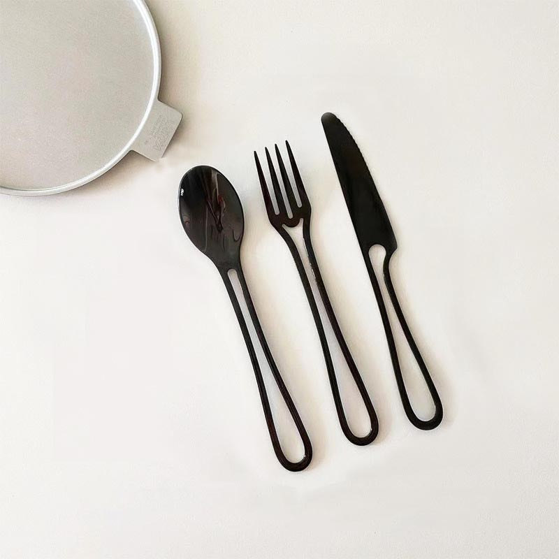Elegant Svelte Void Cutlery Collection featuring minimalist design with hollow handles