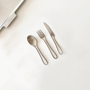 Elegant Svelte Void Cutlery Collection featuring minimalist design with hollow handles