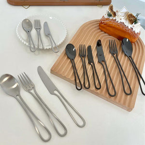 Elegant Svelte Void Cutlery Collection featuring minimalist design with hollow handles