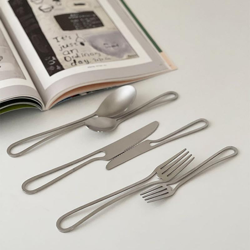 Elegant Svelte Void Cutlery Collection featuring minimalist design with hollow handles