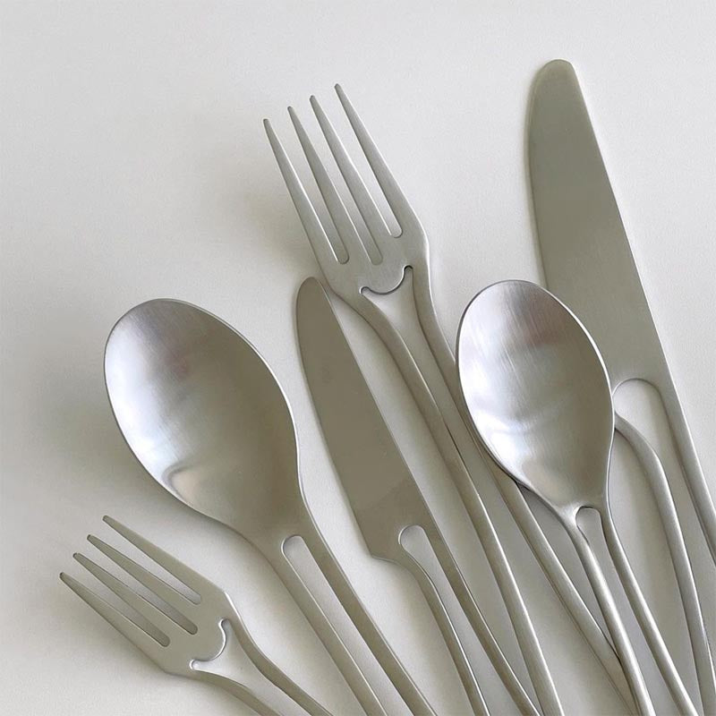 Elegant Svelte Void Cutlery Collection featuring minimalist design with hollow handles