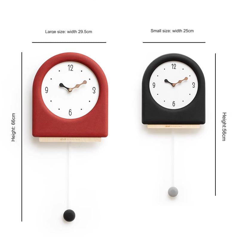 Time's Arc Pendulum Clock showcasing an elegant, minimalist design with a unique arched top and silent movement.