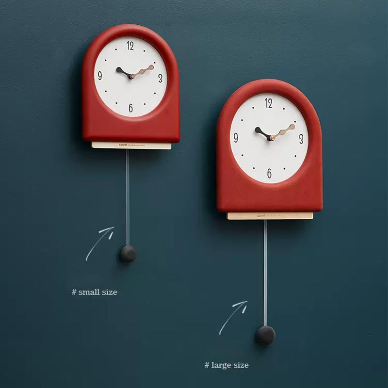 Time's Arc Pendulum Clock showcasing an elegant, minimalist design with a unique arched top and silent movement.