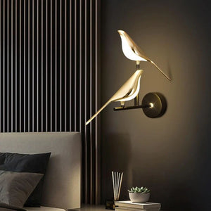 Whispering Wings LED Wall Sconce featuring an acrylic lampshade and high-quality aluminum body, perfect for eco-friendly and stylish home lighting.