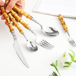 A set of eco-friendly bamboo and stainless steel cutlery