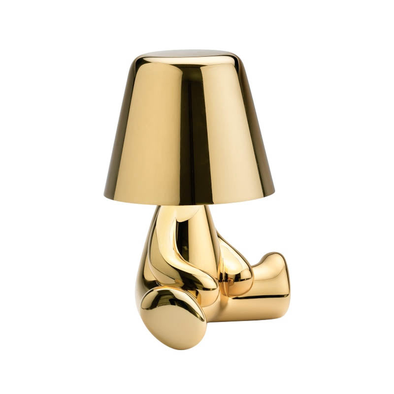 Golden Brothers Portable Table Lamp with a classic gold finish on LuxusHeim