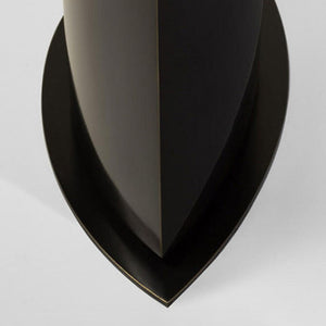 Apixa Table Lamp showcasing a sleek black finish and modern design on LuxusHeim