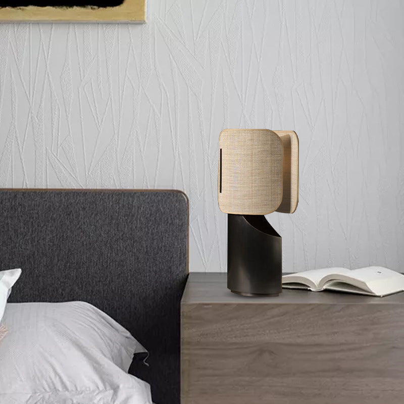 Apixa Table Lamp showcasing a sleek black finish and modern design on LuxusHeim