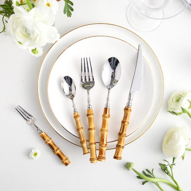 A set of eco-friendly bamboo and stainless steel cutlery