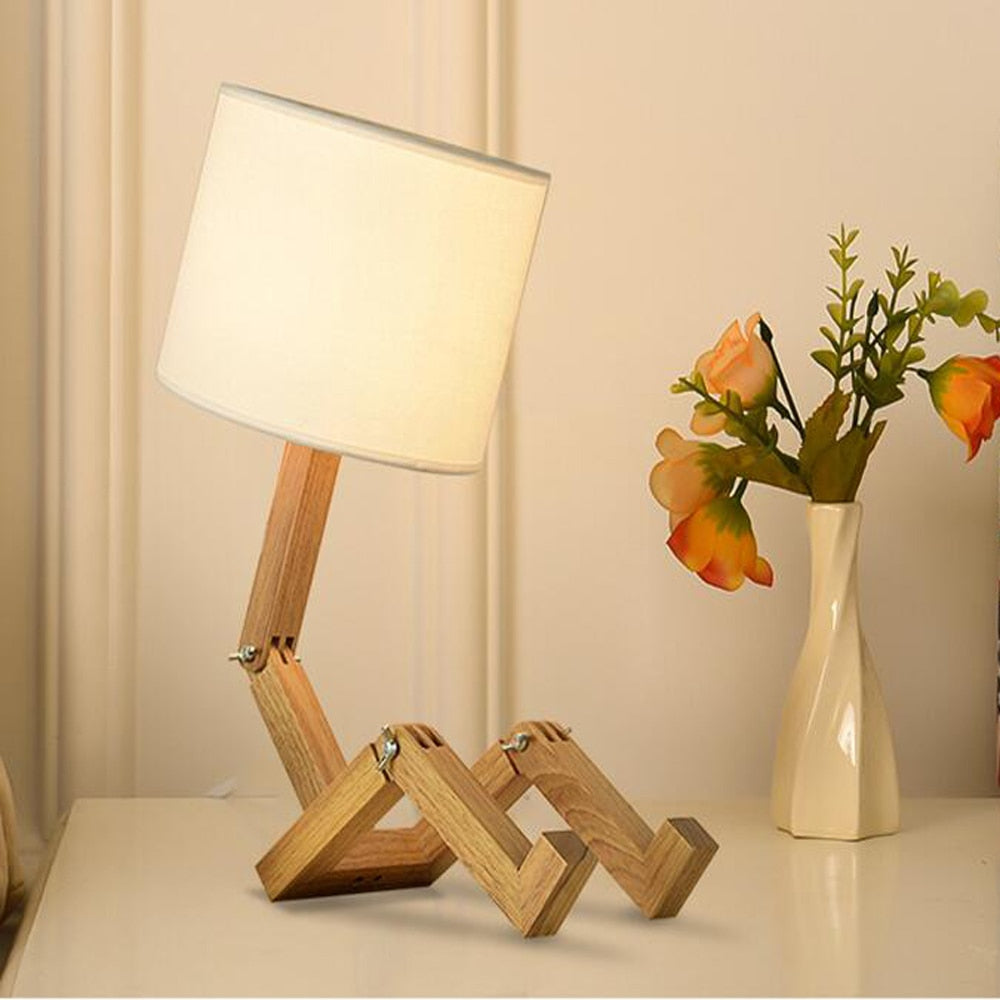 Humanoid Versatile Desk Lamp showcasing its unique design and flexible joints on LuxusHeim.