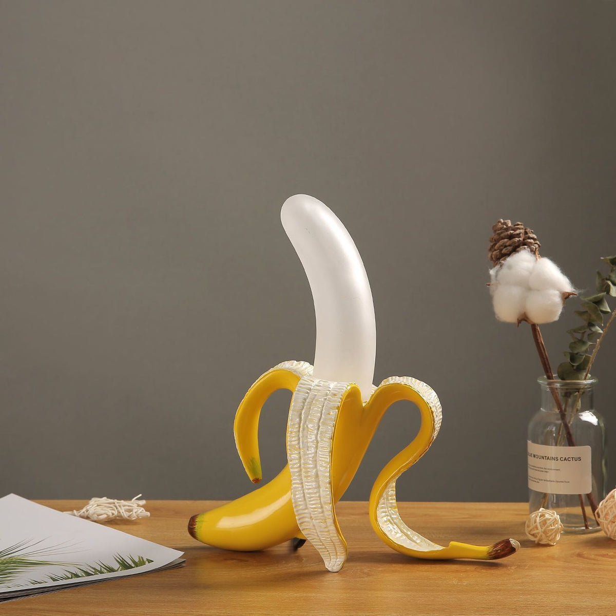 Banana Table Lamp showcasing a playful design and modern elegance on LuxusHeim