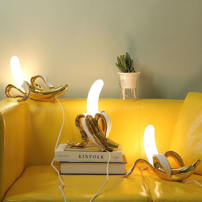 Banana Table Lamp showcasing a playful design and modern elegance on LuxusHeim