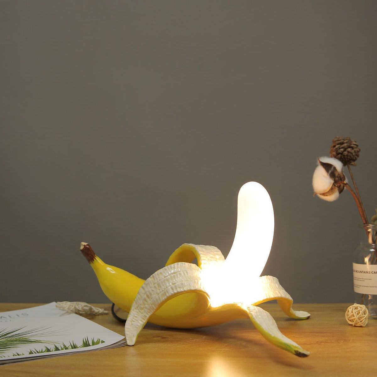 Banana Table Lamp showcasing a playful design and modern elegance on LuxusHeim