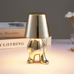 Golden Brothers Portable Table Lamp with a classic gold finish on LuxusHeim