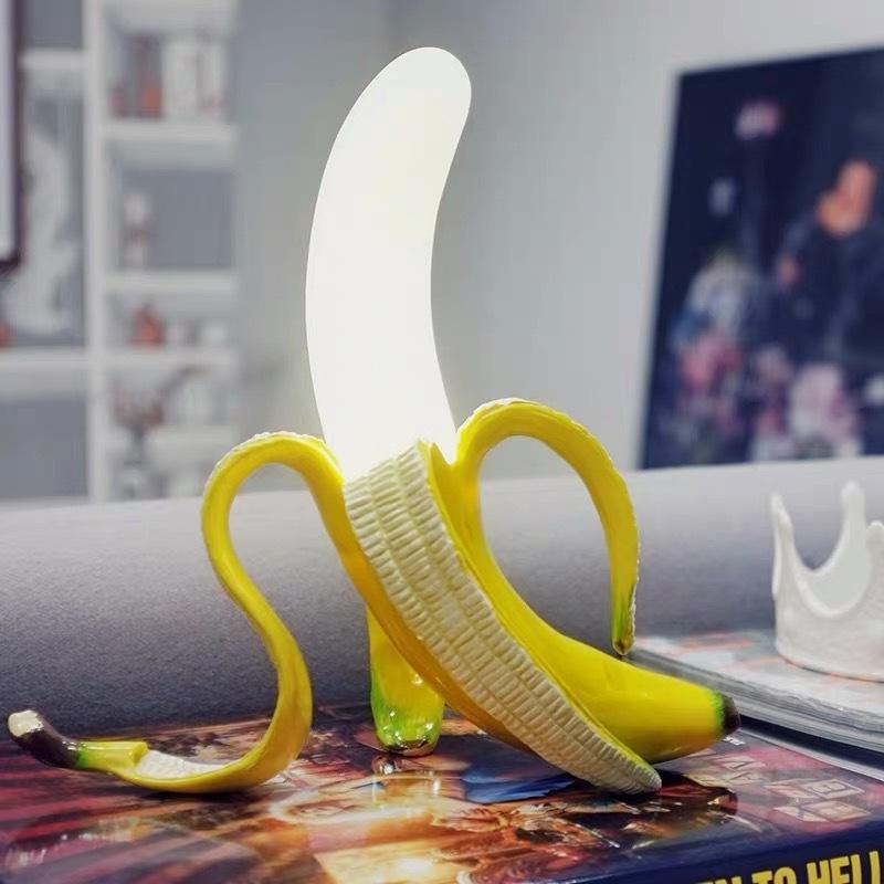 Banana Table Lamp showcasing a playful design and modern elegance on LuxusHeim