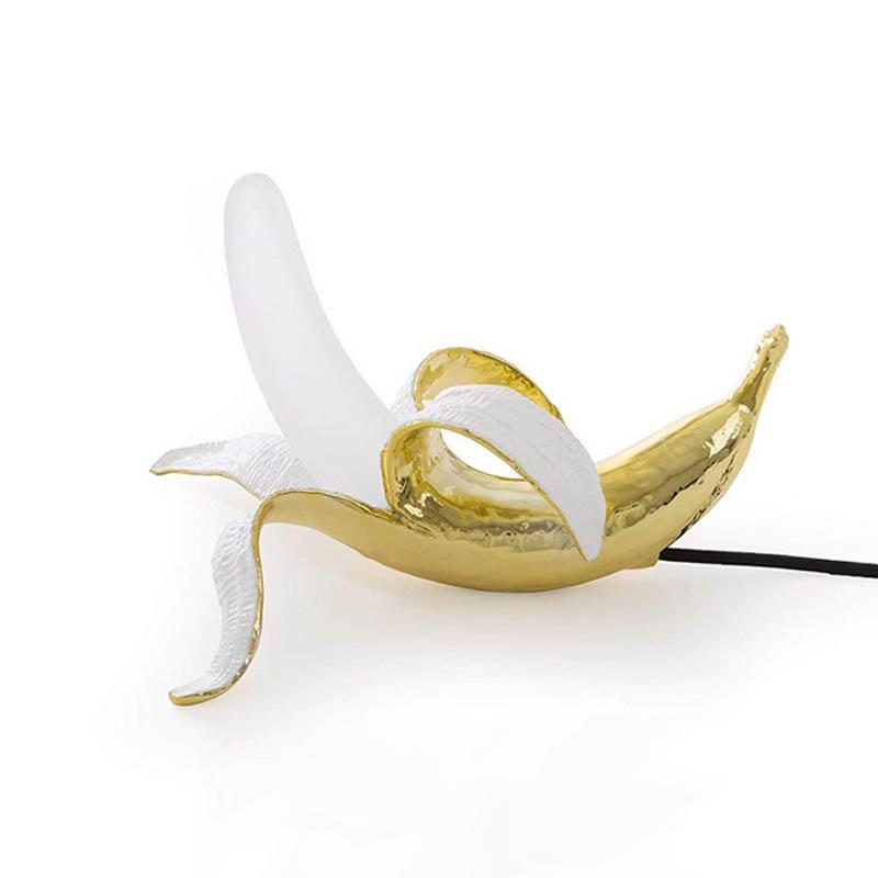 Banana Table Lamp showcasing a playful design and modern elegance on LuxusHeim