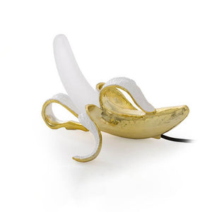 Banana Table Lamp showcasing a playful design and modern elegance on LuxusHeim