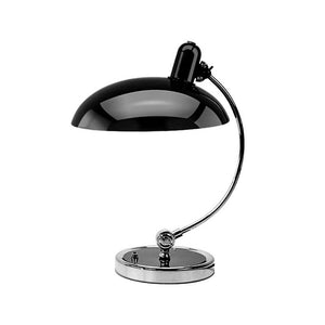 Brano Desk Lamp showcasing its sleek design and elegant finish on LuxusHeim.