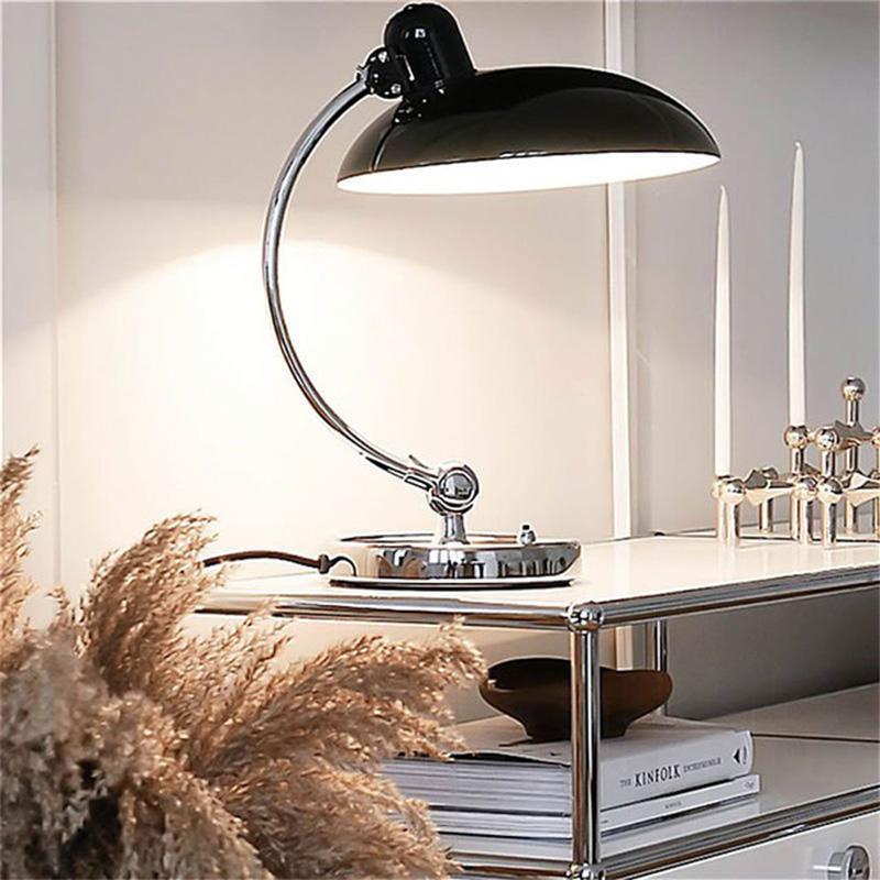 Brano Desk Lamp showcasing its sleek design and elegant finish on LuxusHeim.