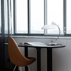 Brano Desk Lamp showcasing its sleek design and elegant finish on LuxusHeim.