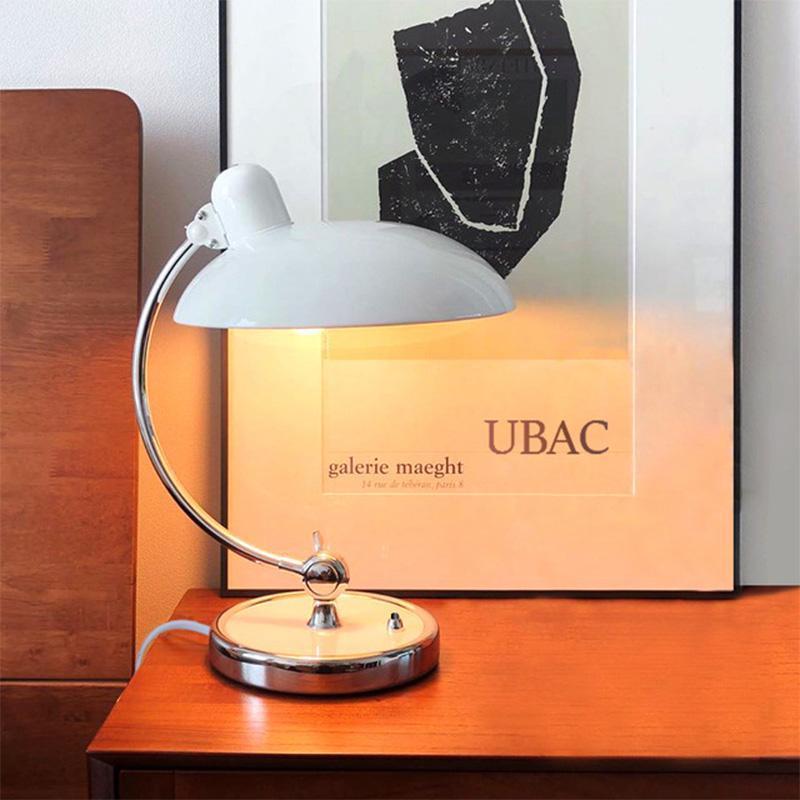 Brano Desk Lamp showcasing its sleek design and elegant finish on LuxusHeim.