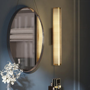 Radiant Elegance Vanity Sconce casting a warm 3000k glow, showcasing its modern open design and premium metal and acrylic craftsmanship.