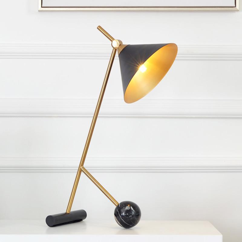 Clio Table Lamp showcasing its modern design and elegant finish on LuxusHeim.