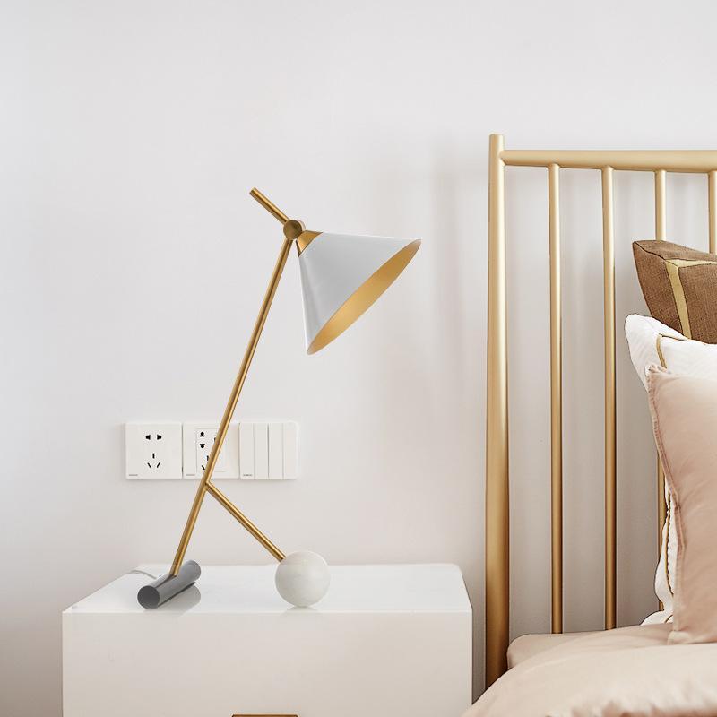 Clio Table Lamp showcasing its modern design and elegant finish on LuxusHeim.