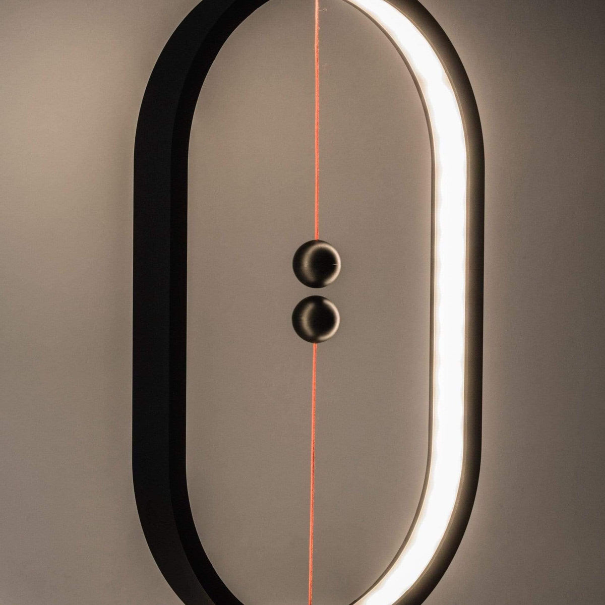 Heng Balance Desk Lamp showcasing its unique balance mechanism and sleek design on LuxusHeim.