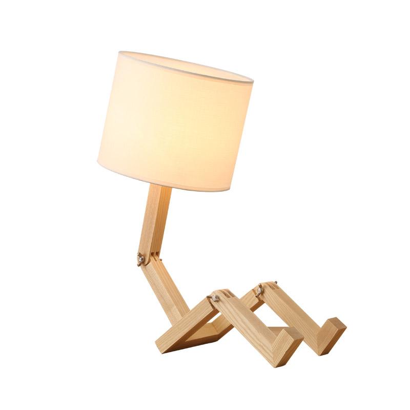 Humanoid Versatile Desk Lamp showcasing its unique design and flexible joints on LuxusHeim.