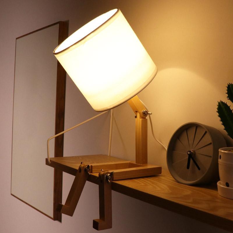 Humanoid Versatile Desk Lamp showcasing its unique design and flexible joints on LuxusHeim.