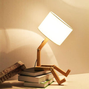 Humanoid Versatile Desk Lamp showcasing its unique design and flexible joints on LuxusHeim.