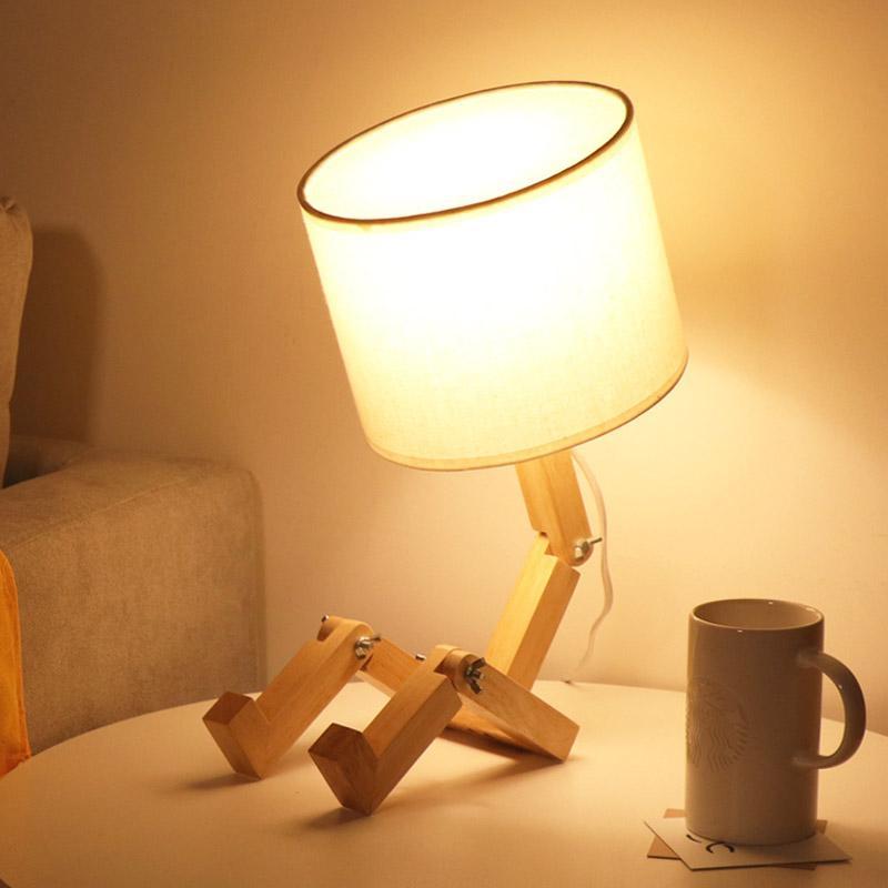 Humanoid Versatile Desk Lamp showcasing its unique design and flexible joints on LuxusHeim.