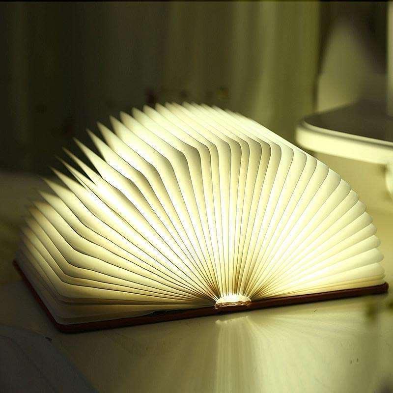 Luminous Folding Book Night Light opened to showcase its magical glow on LuxusHeim.