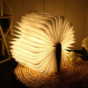 Luminous Folding Book Night Light opened to showcase its magical glow on LuxusHeim.
